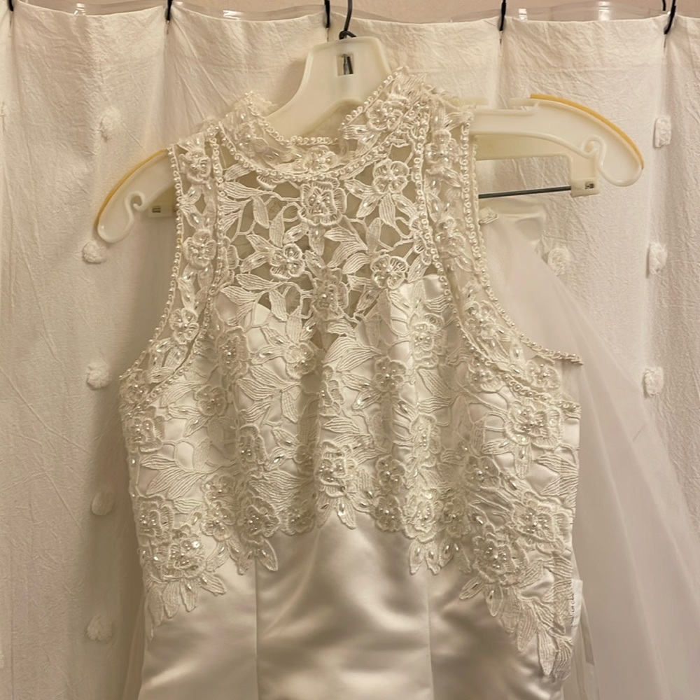 Gorgeous high neck wedding dress with bustle